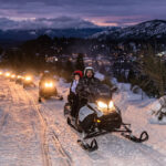 Aventura Nocturna en Cerro Catedral: Nieve, Moto de Nieve y Cena de Montaña Inolvidable